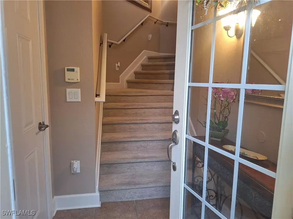 Entry Way - 26485 Lucky Stone Rd #202, Bonita Springs, FL 34135 photo 1 of 4
