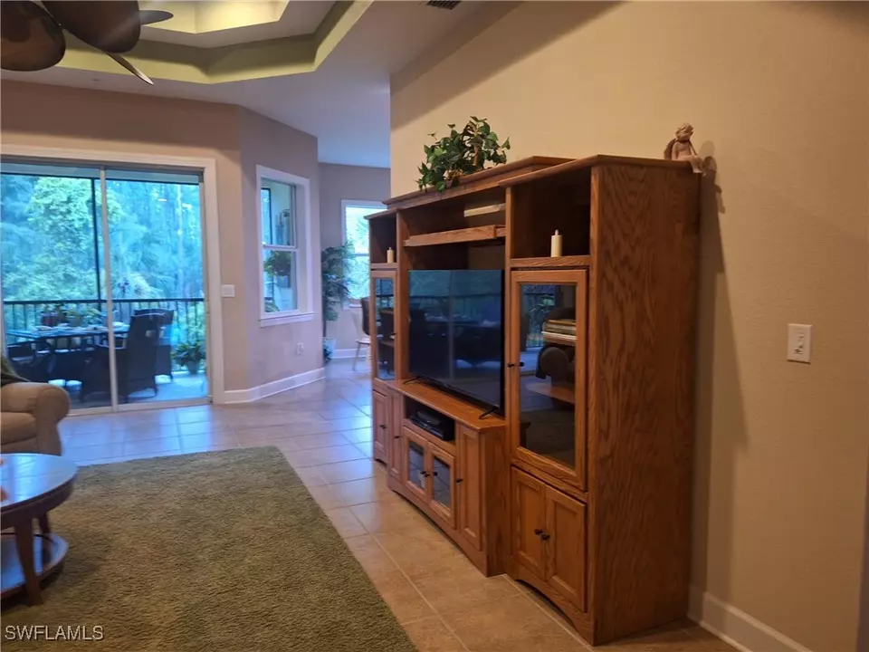 Living - 26485 Lucky Stone Rd #202, Bonita Springs, FL 34135 photo 2 of 3