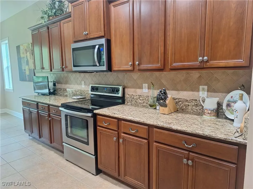 Kitchen - 26485 Lucky Stone Rd #202, Bonita Springs, FL 34135 photo 2 of 4
