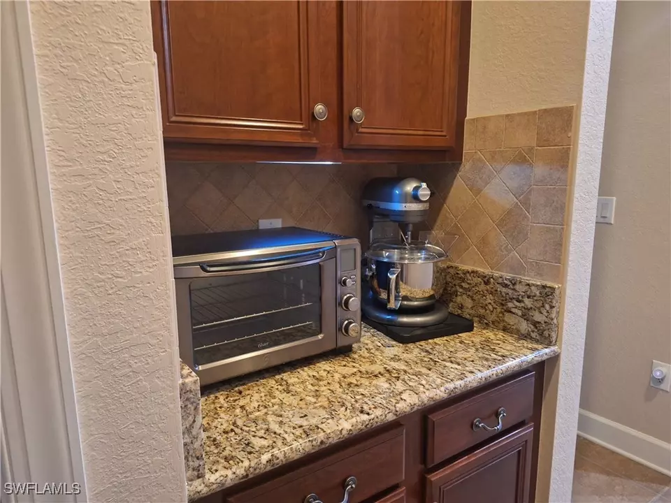 Kitchen - 26485 Lucky Stone Rd #202, Bonita Springs, FL 34135 photo 4 of 4