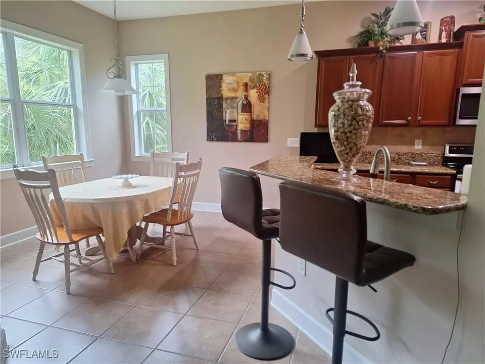 Dining - 26485 Lucky Stone Rd #202, Bonita Springs, FL 34135 photo 1 of 1