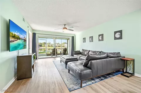 Living - 885 New Waterford Dr #U101, Naples, FL 34104 photo 1 of 2