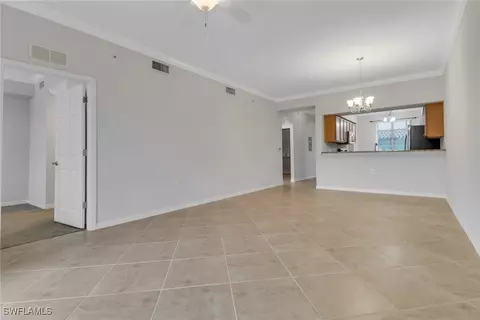 Living - 9723 Acqua Ct #314, Naples, FL 34113 photo 4 of 4