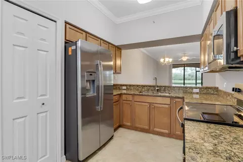 Kitchen - 9723 Acqua Ct #314, Naples, FL 34113 photo 2 of 3