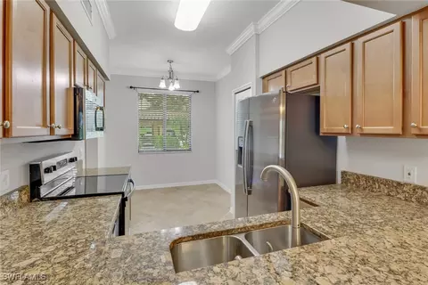 Kitchen - 9723 Acqua Ct #314, Naples, FL 34113 photo 1 of 3