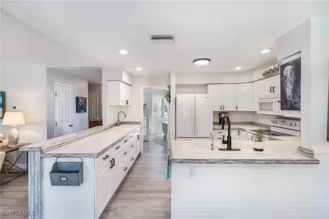 Kitchen - 20520 Pine Tree Ln, Estero, FL 33928 photo 2 of 4