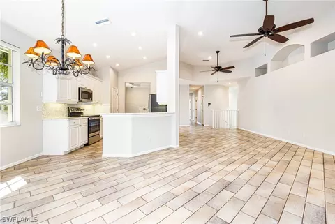 Living - 19091 Ridgepoint Dr #202, Estero, FL 33928 photo 1 of 2