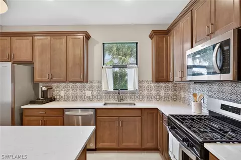 Kitchen - 20548 Pebble Glen Dr, Estero, FL 33928 photo 5 of 6