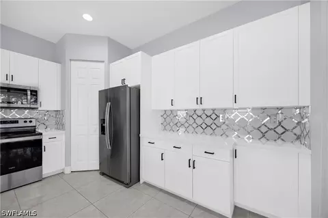 Kitchen - 9045 Madrid Cir, Naples, FL 34104 photo 2 of 3