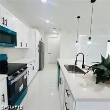 545 Trinity St E, Lehigh Acres, FL 33974 photo 4