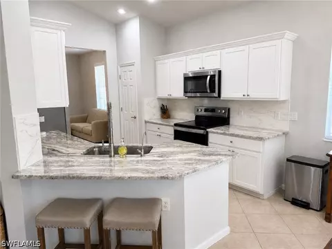 Kitchen - 19081 Ridgepoint Dr #201, Estero, FL 33928 photo 3 of 6