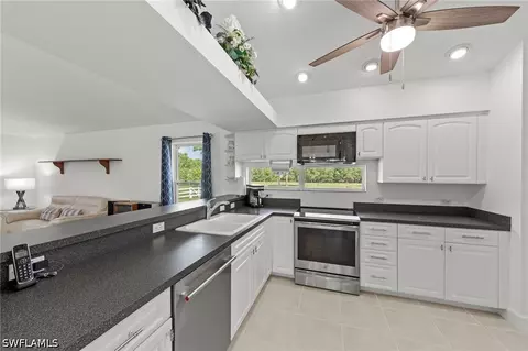 Kitchen - 13541 Stringfellow Rd, Bokeelia, FL 33922 photo 2 of 3