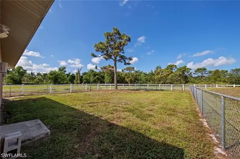 Exterior - 13541 Stringfellow Rd, Bokeelia, FL 33922 photo 7 of 8