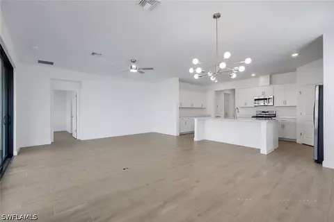 Living - 19232 Gentry Pl, Estero, FL 33928 photo 1 of 2