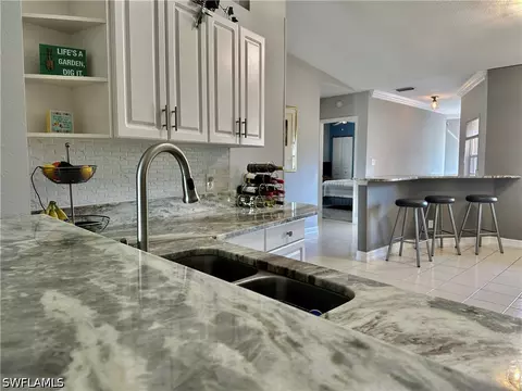Kitchen - 9165 Michael Cir #1002, Naples, FL 34113 photo 4 of 8