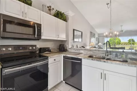 Kitchen - 9165 Michael Cir #1002, Naples, FL 34113 photo 7 of 8