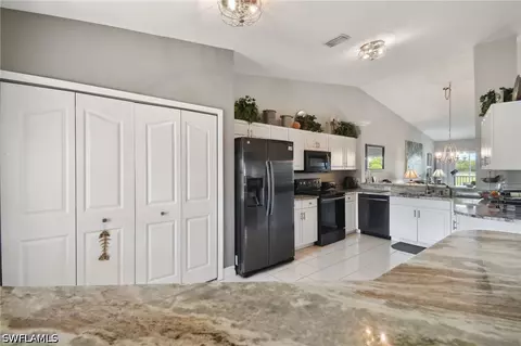 Kitchen - 9165 Michael Cir #1002, Naples, FL 34113 photo 3 of 8