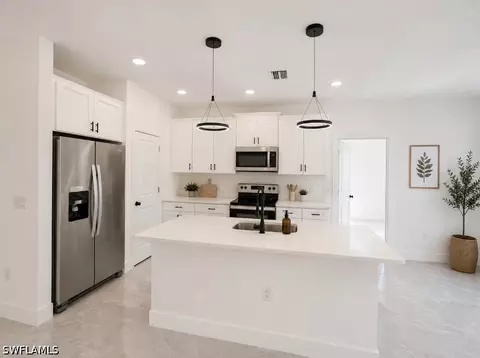 302 Stonybrook Ave, Lehigh Acres, FL 33972