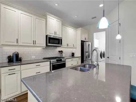 Kitchen - 9604 Estero Grove Way, Estero, FL 33928 photo 3 of 5