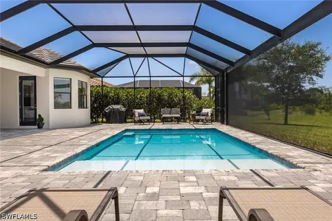 Exterior - 17414 Elkgrove Ln, Estero, FL 33928 photo 8 of 10