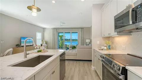 Kitchen - 5034 Draco Cir, Naples, FL 34120 photo 5 of 7