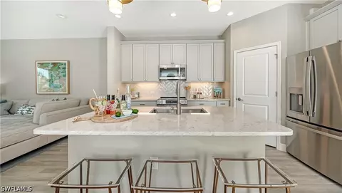 Kitchen - 5034 Draco Cir, Naples, FL 34120 photo 2 of 7