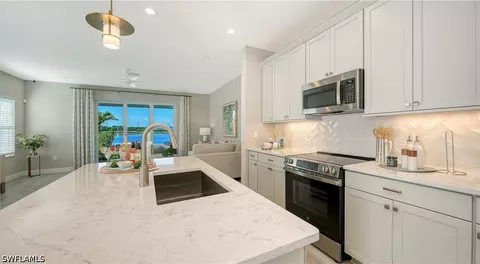Kitchen - 5034 Draco Cir, Naples, FL 34120 photo 4 of 7