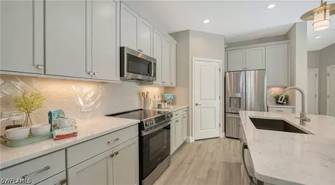 Kitchen - 5034 Draco Cir, Naples, FL 34120 photo 6 of 7