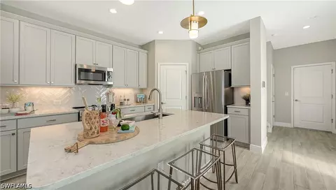 Kitchen - 5034 Draco Cir, Naples, FL 34120 photo 1 of 7