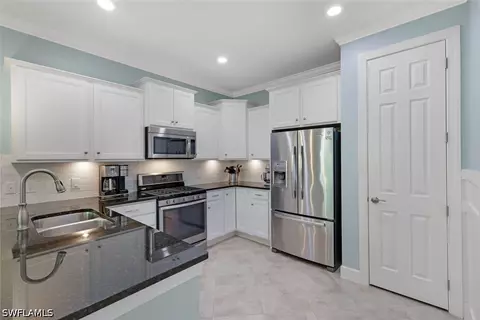 Kitchen - 10661 Jackson Square Dr, Estero, FL 33928 photo 1 of 2