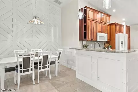 Dining - 20052 Serene Meadow Ln, Estero, FL 33928 photo 2 of 2