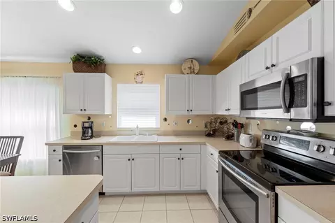Kitchen - 21517 Berwhich Run, Estero, FL 33928 photo 3 of 5