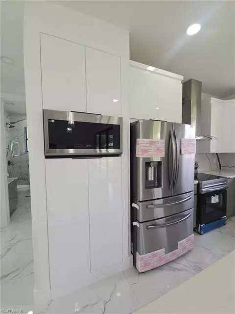 Kitchen - 2101 W 9th St, Lehigh Acres, FL 33972 photo 1 of 5