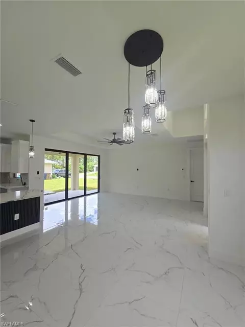 Living - 2101 W 9th St, Lehigh Acres, FL 33972 photo 2 of 3