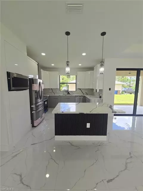 Kitchen - 2101 W 9th St, Lehigh Acres, FL 33972 photo 2 of 5