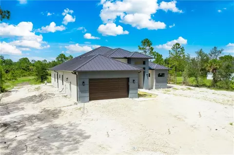 Exterior - 2481 24th Ave NE, Naples, FL 34120 photo 6 of 9