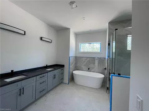 Bath - 2481 24th Ave NE, Naples, FL 34120 photo 2 of 12