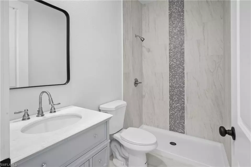 Bath - 360362 Grant Blvd, Lehigh Acres, FL 33974 photo 2 of 3