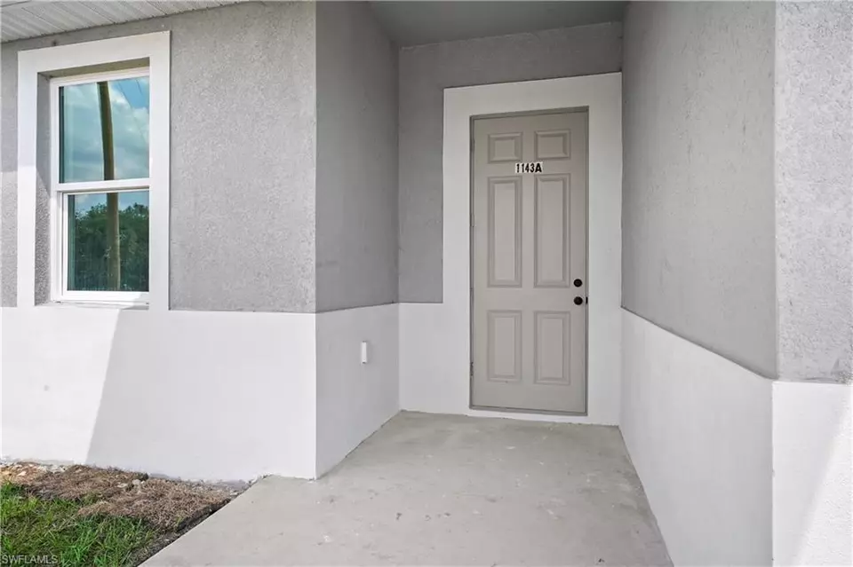 Entry Way - 360362 Grant Blvd, Lehigh Acres, FL 33974 photo 2 of 2