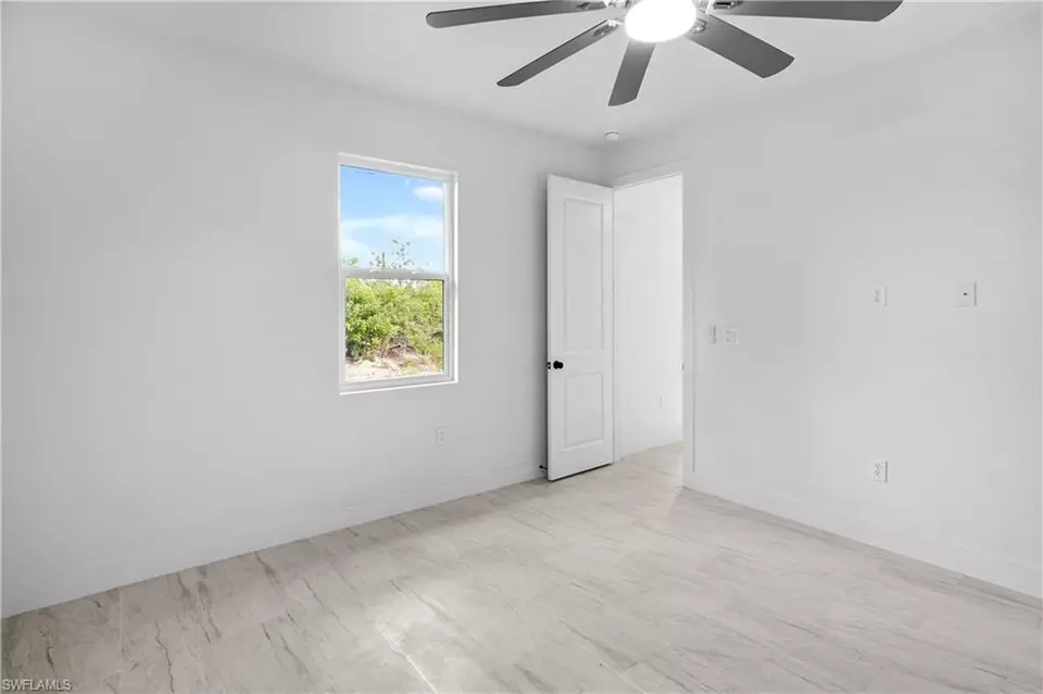 Bedroom - 360362 Grant Blvd, Lehigh Acres, FL 33974 photo 2 of 7