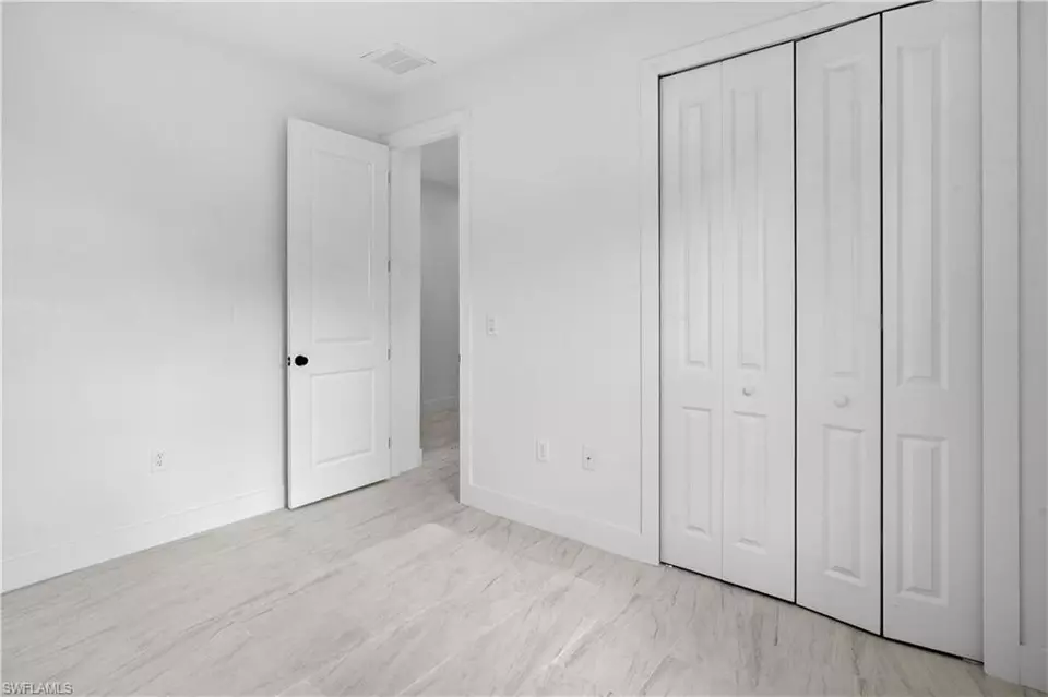 Bedroom - 360362 Grant Blvd, Lehigh Acres, FL 33974 photo 6 of 7