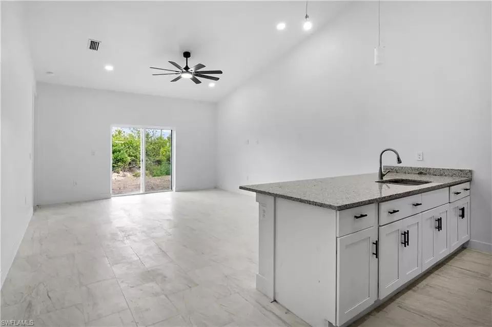 Living - 360362 Grant Blvd, Lehigh Acres, FL 33974 photo 2 of 4
