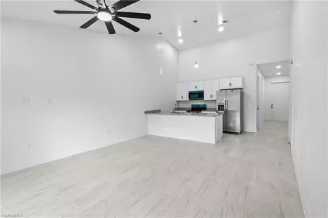 Living - 360362 Grant Blvd, Lehigh Acres, FL 33974 photo 1 of 4