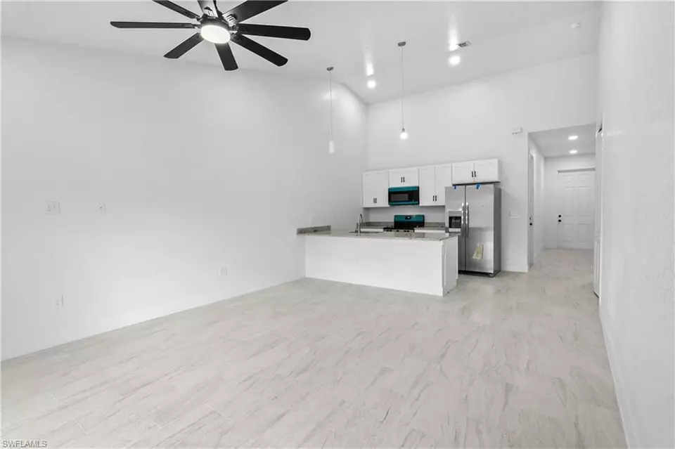 Living - 360362 Grant Blvd, Lehigh Acres, FL 33974 photo 1 of 4