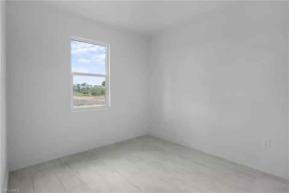 Bedroom - 360362 Grant Blvd, Lehigh Acres, FL 33974 photo 5 of 7