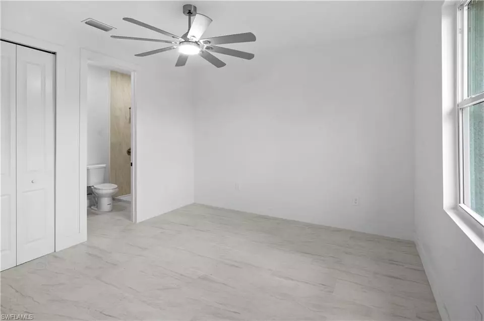 Bedroom - 360362 Grant Blvd, Lehigh Acres, FL 33974 photo 1 of 7