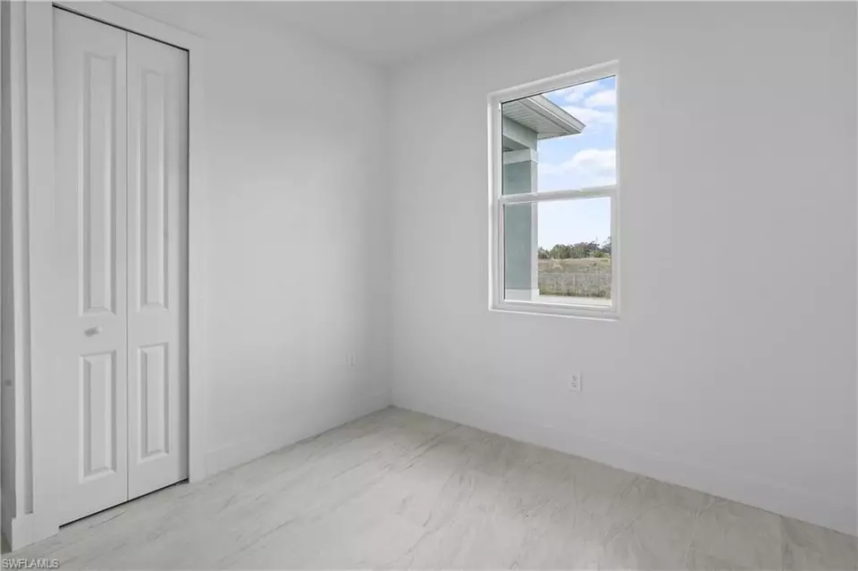 Bedroom - 360362 Grant Blvd, Lehigh Acres, FL 33974 photo 4 of 7