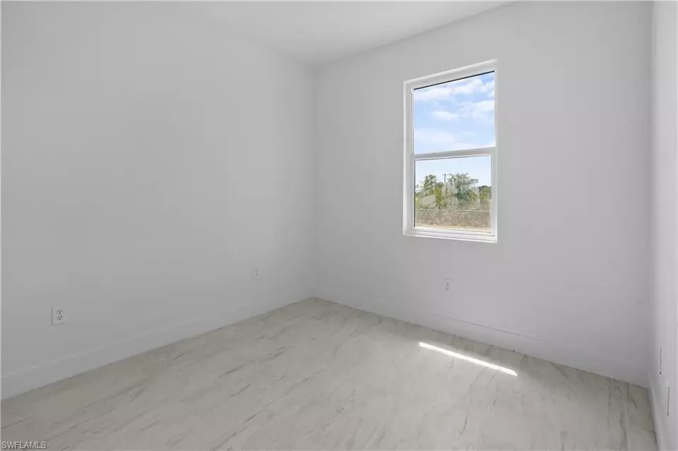 Bedroom - 360362 Grant Blvd, Lehigh Acres, FL 33974 photo 3 of 7