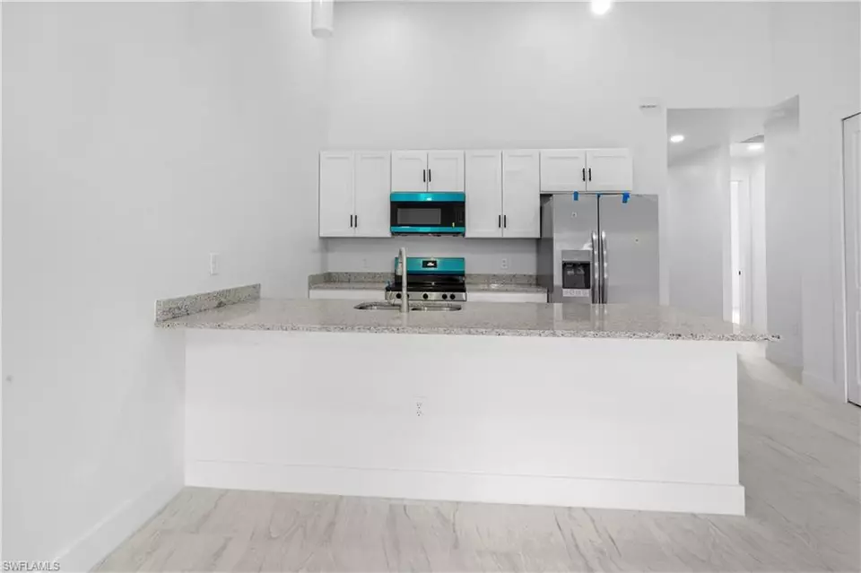 Kitchen - 360362 Grant Blvd, Lehigh Acres, FL 33974 photo 4 of 4