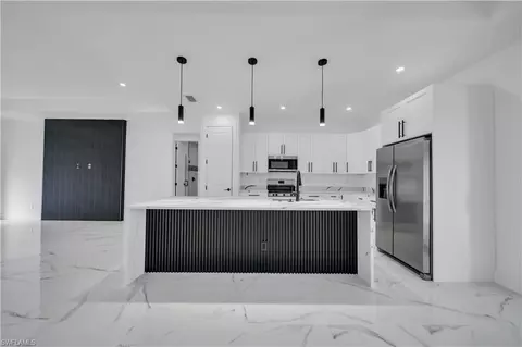 Kitchen - 2224 Della Dr, Naples, FL 34117 photo 2 of 2